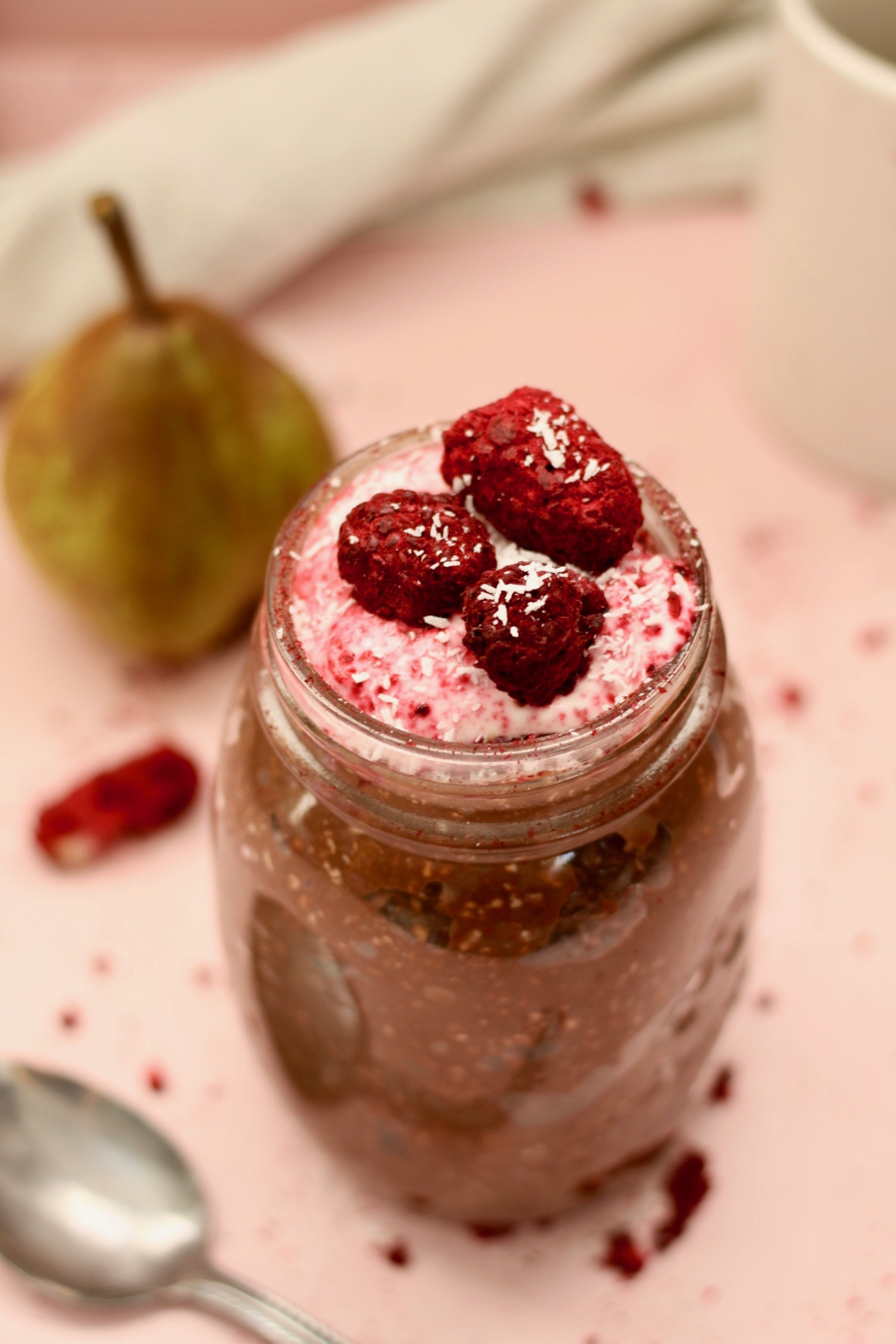 berry topped Chocolate Coconut Bircher Muesli birds eye view