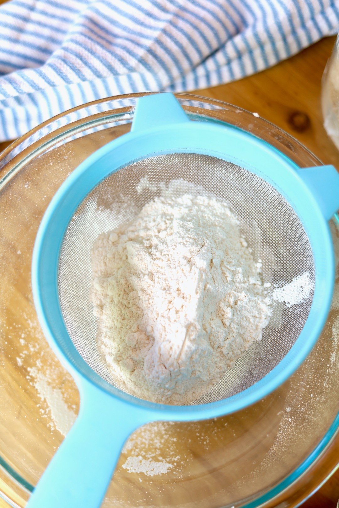 cake flour in a sieve