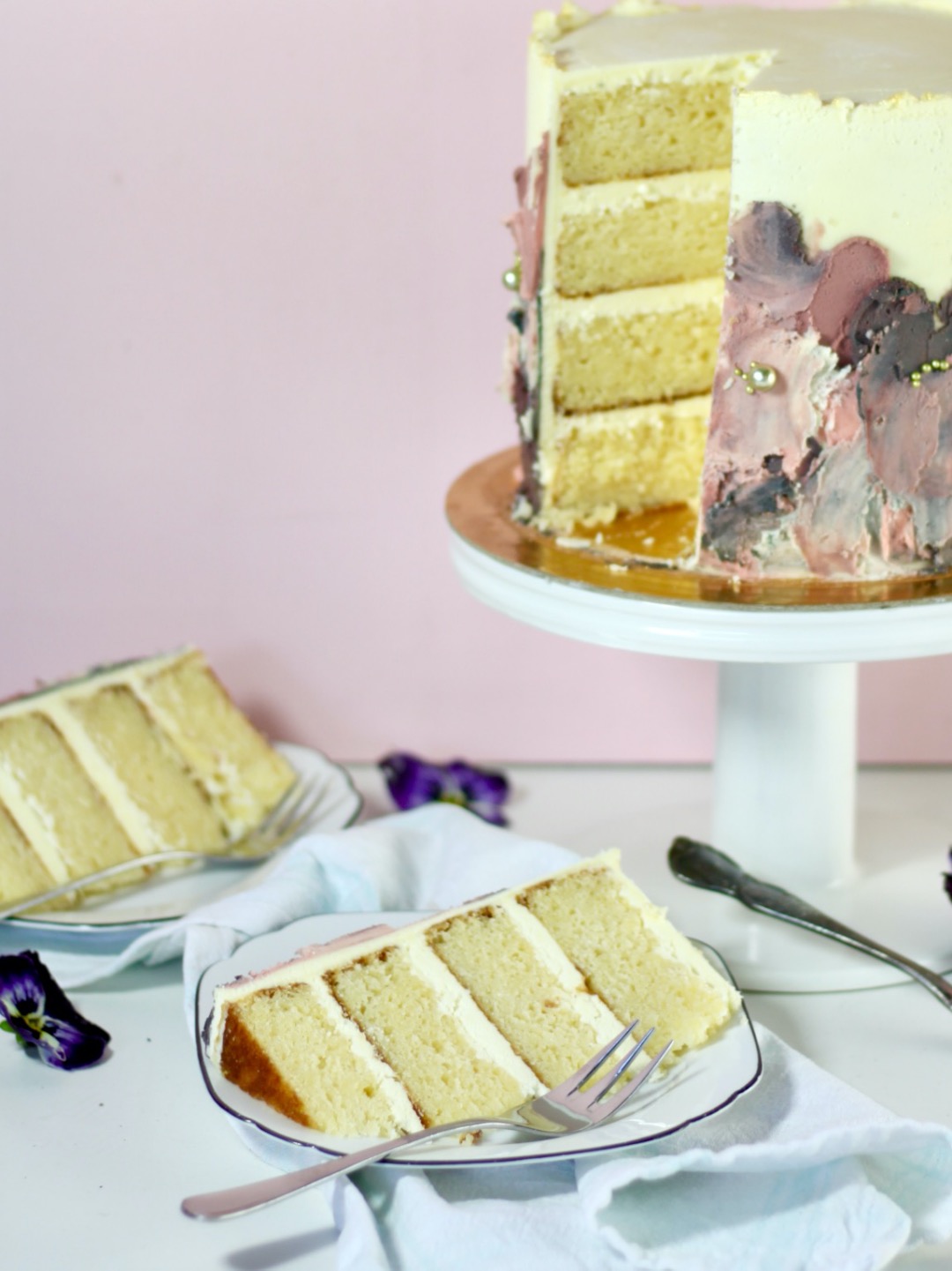 gluten free vanilla layer cake, cut into two pieces