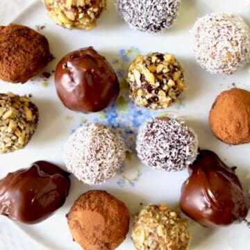 Cake balls with different coatings on a plate