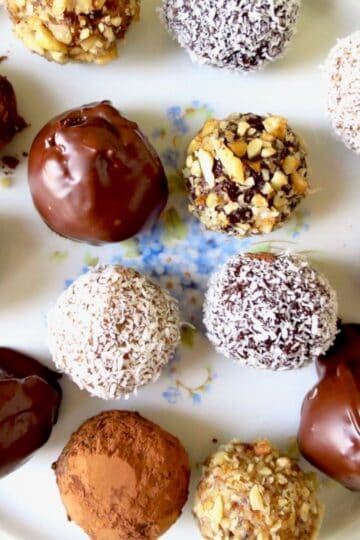 Cake balls with different coatings on a plate