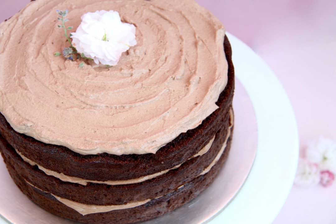 Chocolate layer cake disguising sunken cake