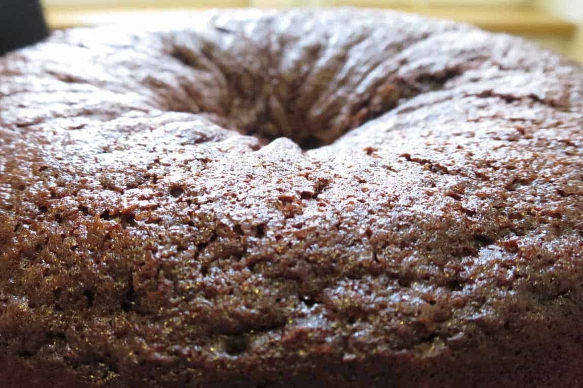 Front on view of baked chocolate cake with hole