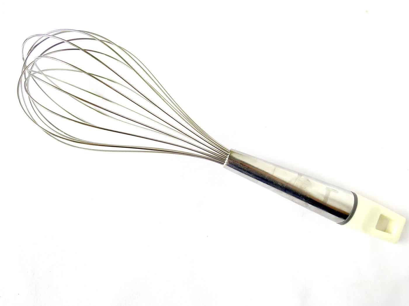 A stand alone whisk with a white background.