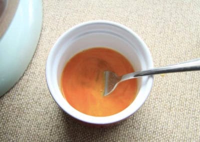 A whisked egg in a ramekin
