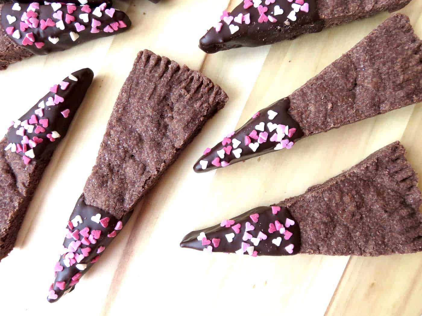 Wedges of chocolate dipped shortbread. The tips are covered in chocolate and sprinkles