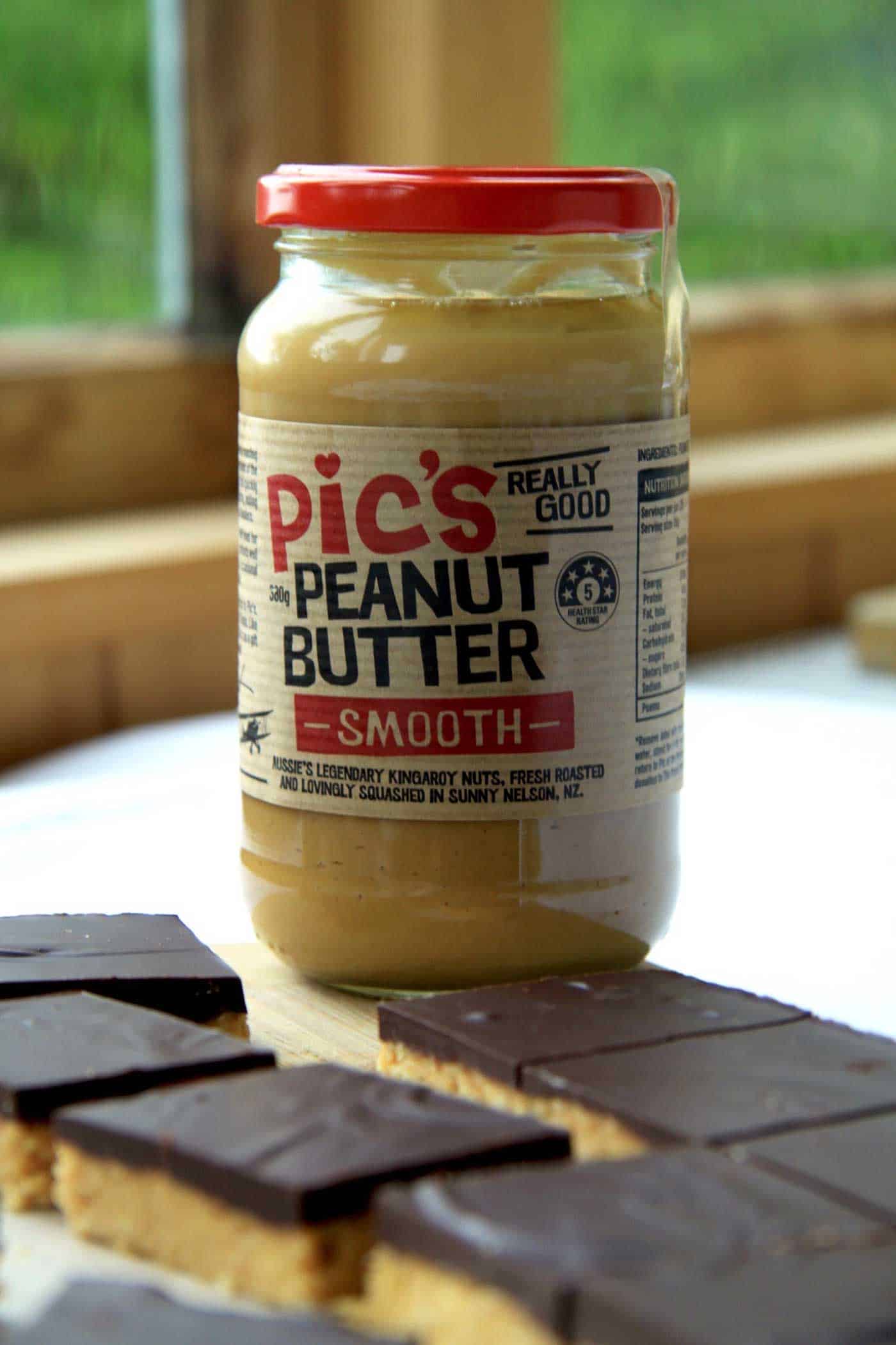 Pic's Peanut Butter Jar with peanut butter bars next to it