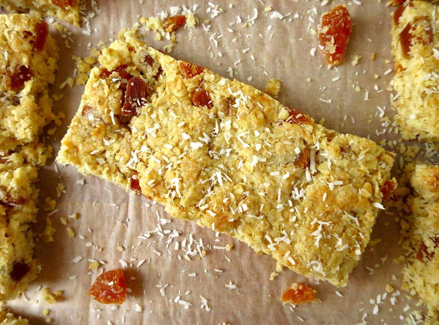 One slice of apricot coconut bar, on an angle