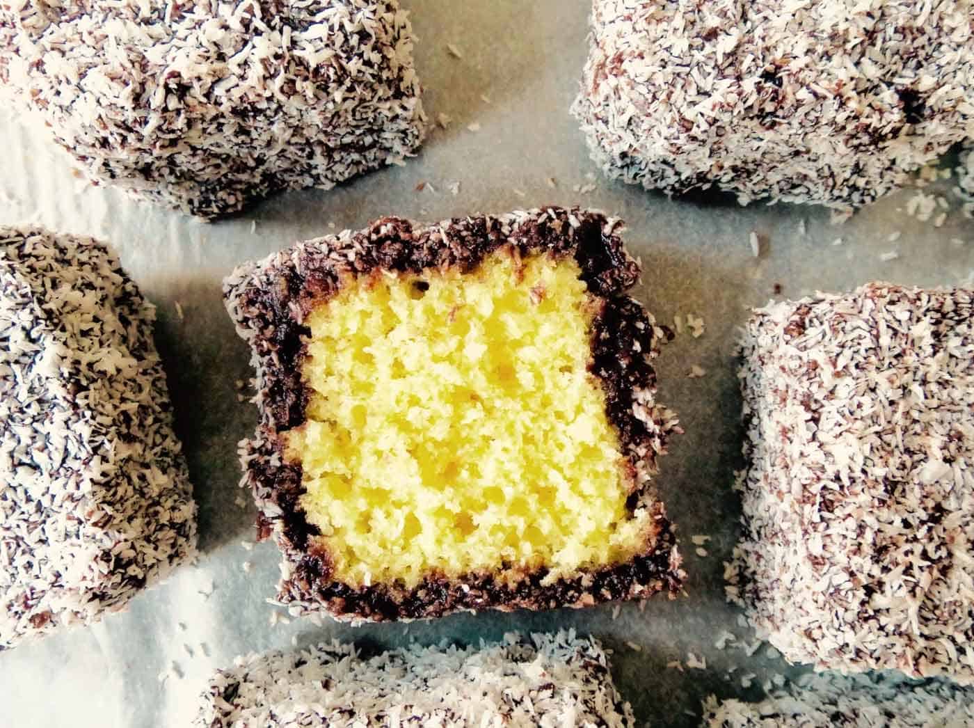 Chocolate and coconut covered lamingtons without filing .