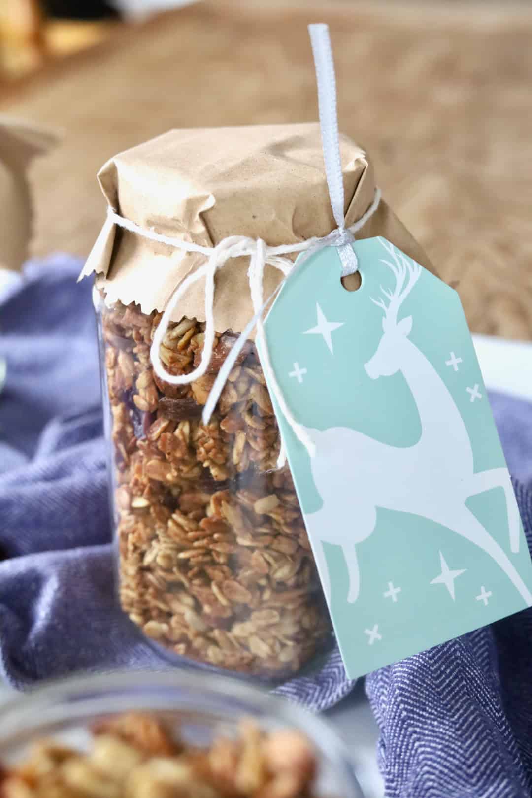 Granola packed in a jar with a gift tag