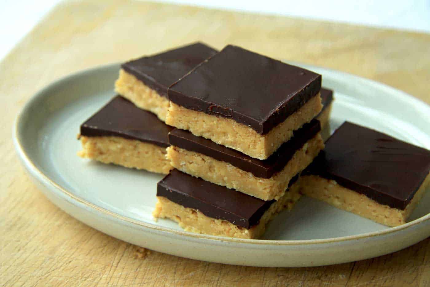 A serving plate of chocolate peanut butter bars
