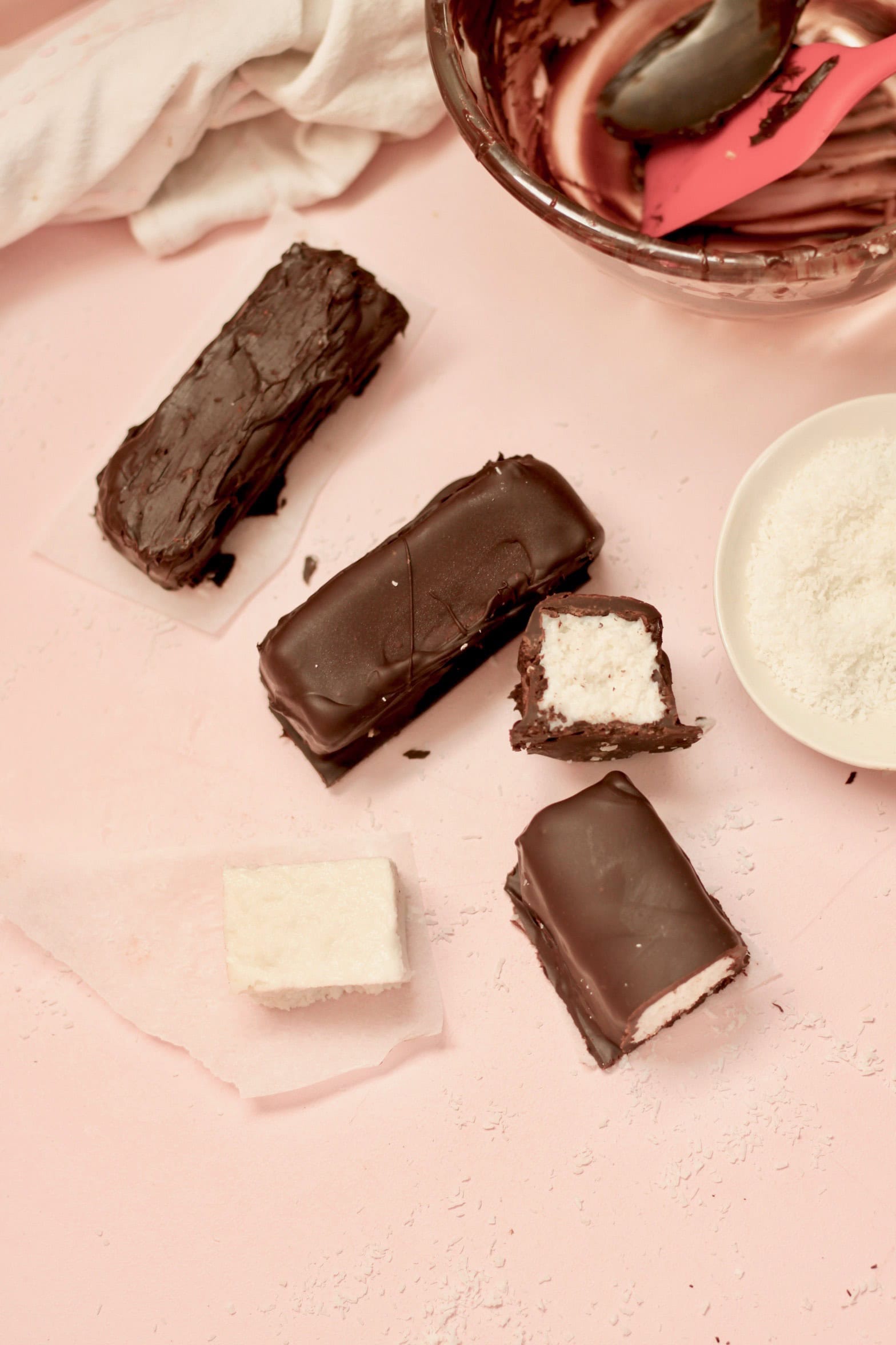 Bounty bars with some covered in chocolate and some uncovered