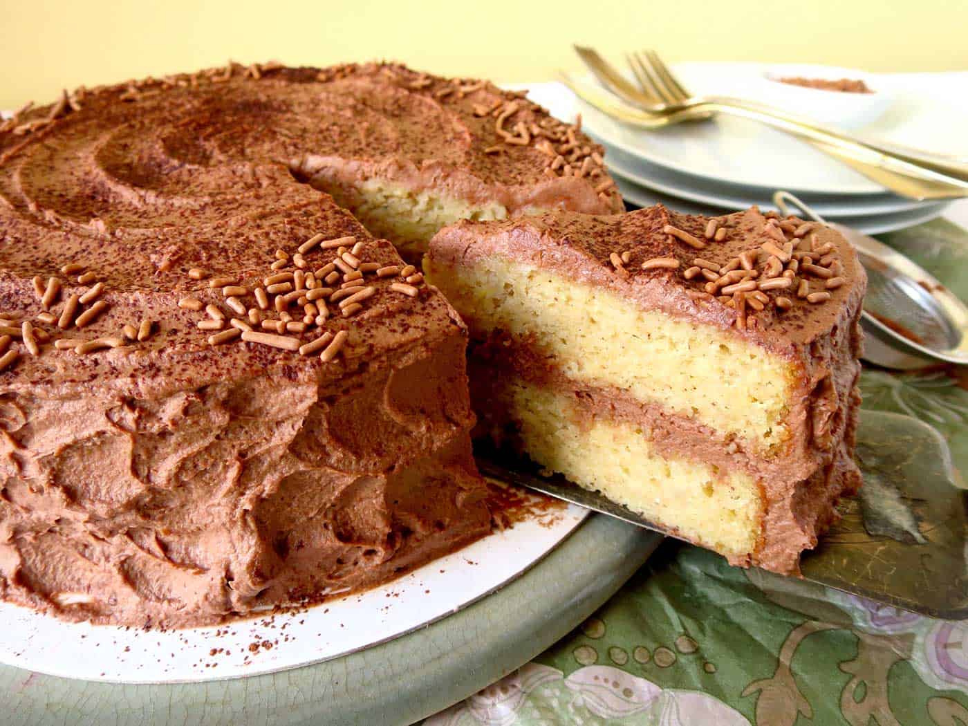 Banana cake with a slice ready to be served.