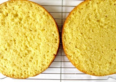 Two layers of perfect vanilla cake which have been levelled. The texture is light and fluffy.