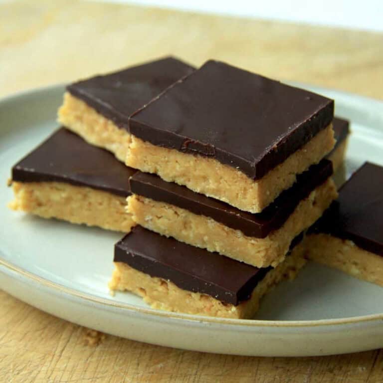 A dish stacked with moorish Peanut butter Chocolate Slice.