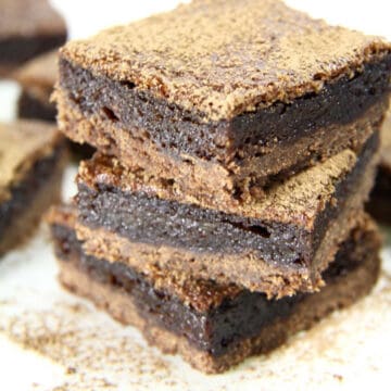 Three delicious chocolate custard bars stacked on top of each other.