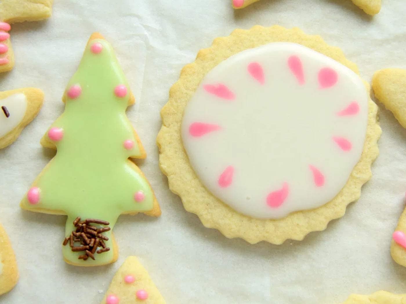 Iced Christmas tree and circle sugar cookies.