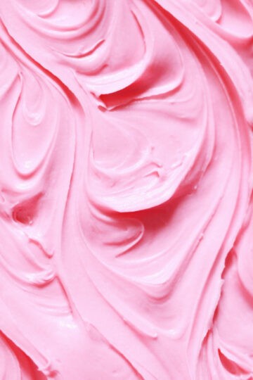 Creamy bright pink buttercream, swirled in patterns.