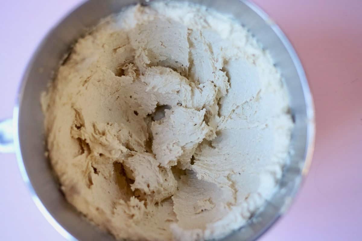 A mixing bowl of creamed butter and sugar.